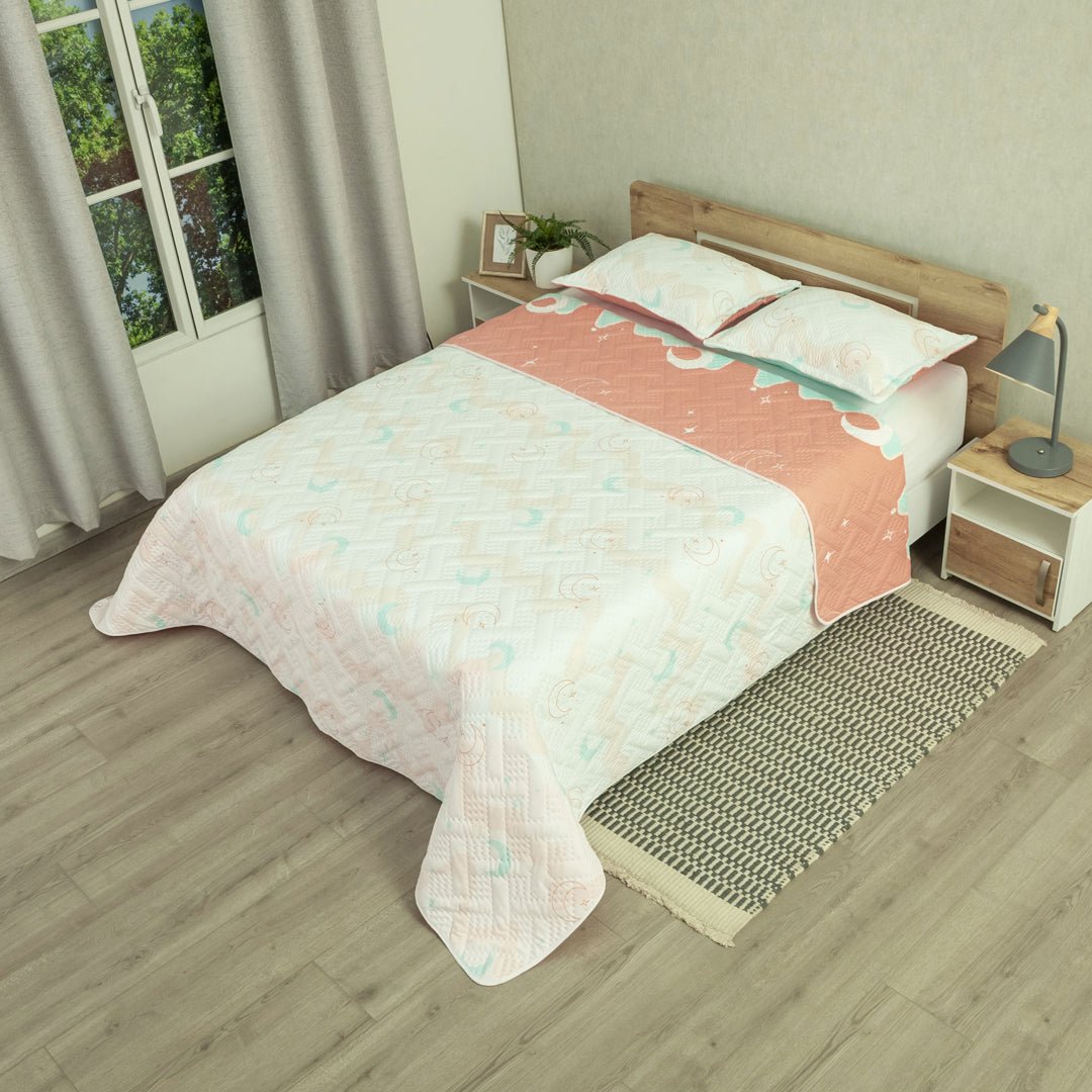 Cubrelecho Doble Faz Style Sueño Lunar Rosado Claro y Naranja Claro para Cama Semidoble 120 X 190 Cm de Lunas - TENDIDOS Y CUBRELECHOS | Bylmo