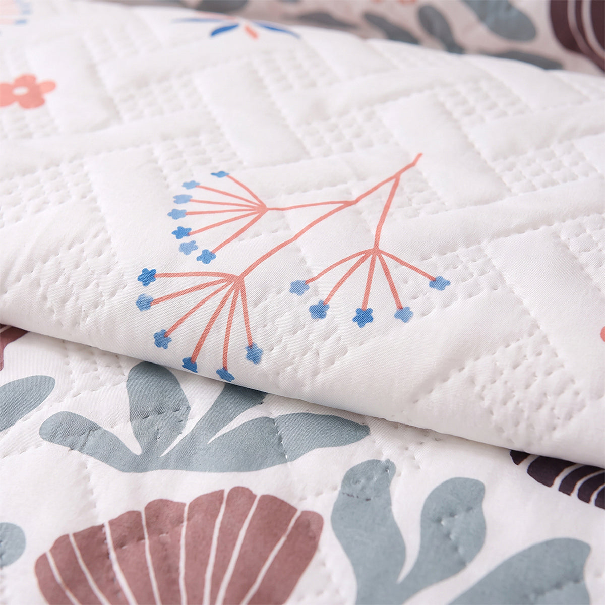 Cubrelecho sencillo Reef Rosa blanco y salmón en microfibra 100x190 cm