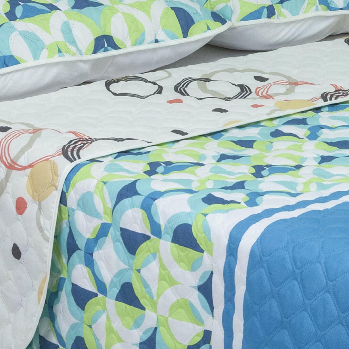 Cubrelecho Doble Faz Convex Verde Limón y Azul Para Cama King 200 X 200 Cm de Círculos Entrelazados - Tendidos y Cubrelechos | Bylmo