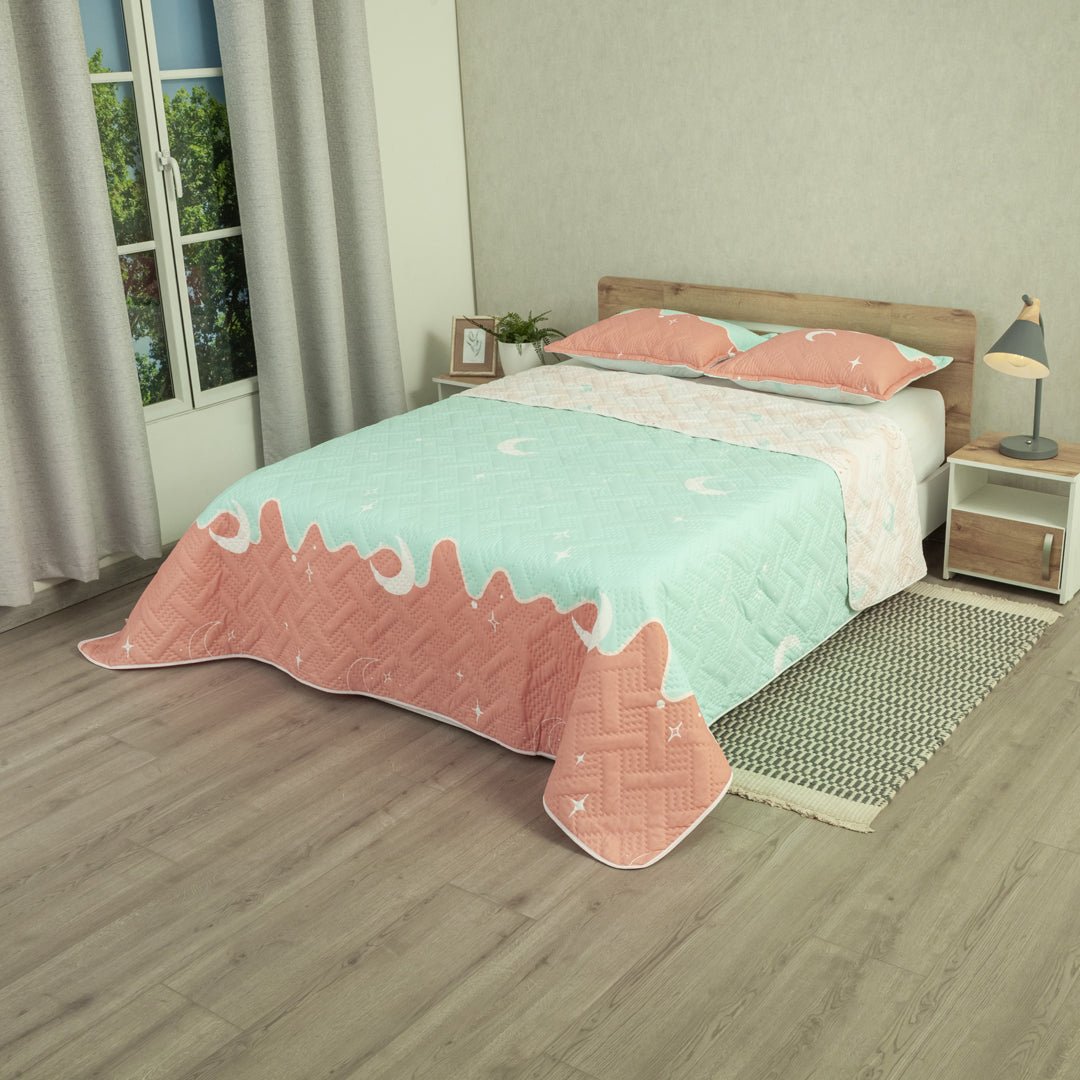 Cubrelecho Doble Faz Style Sueño Lunar Rosado Claro y Naranja Claro para Cama Semidoble 120 X 190 Cm de Lunas - TENDIDOS Y CUBRELECHOS | Bylmo