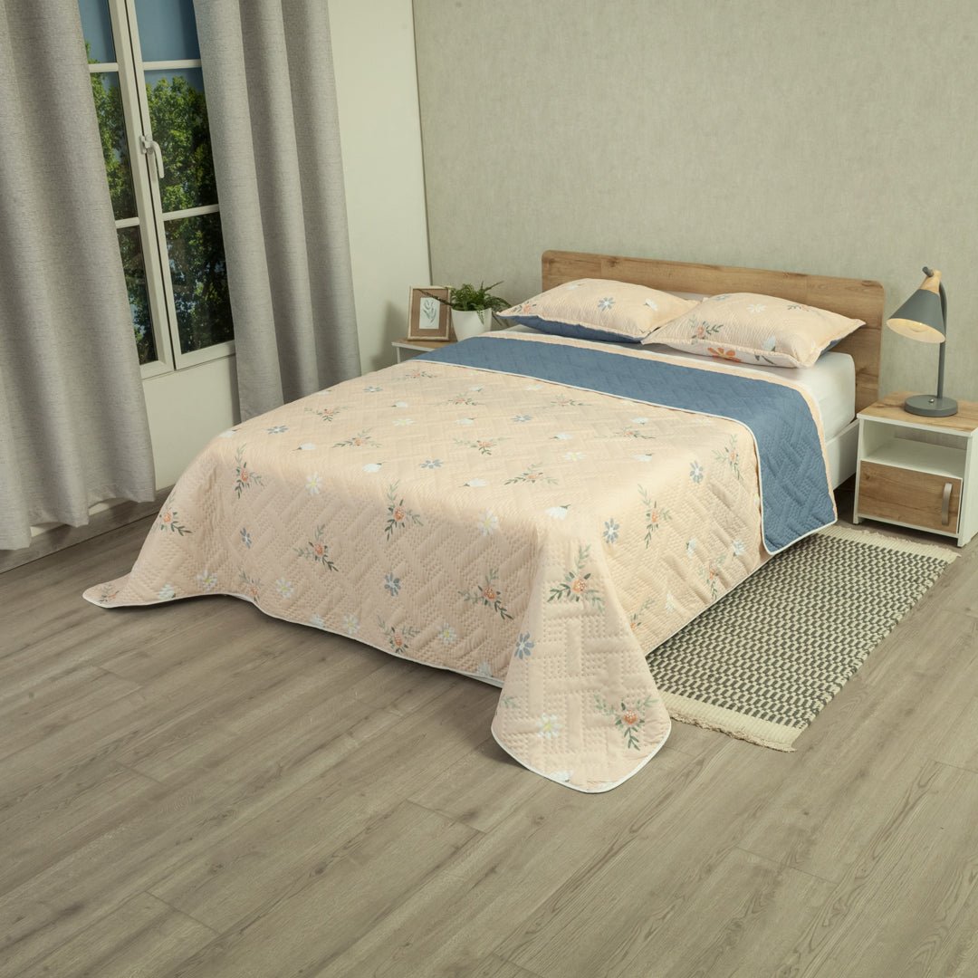 Cubrelecho Doble Faz Style Jardín Beige Claro y Azul Oscuro para Cama Semidoble 120 X 190 Cm de Hojas - TENDIDOS Y CUBRELECHOS | Bylmo
