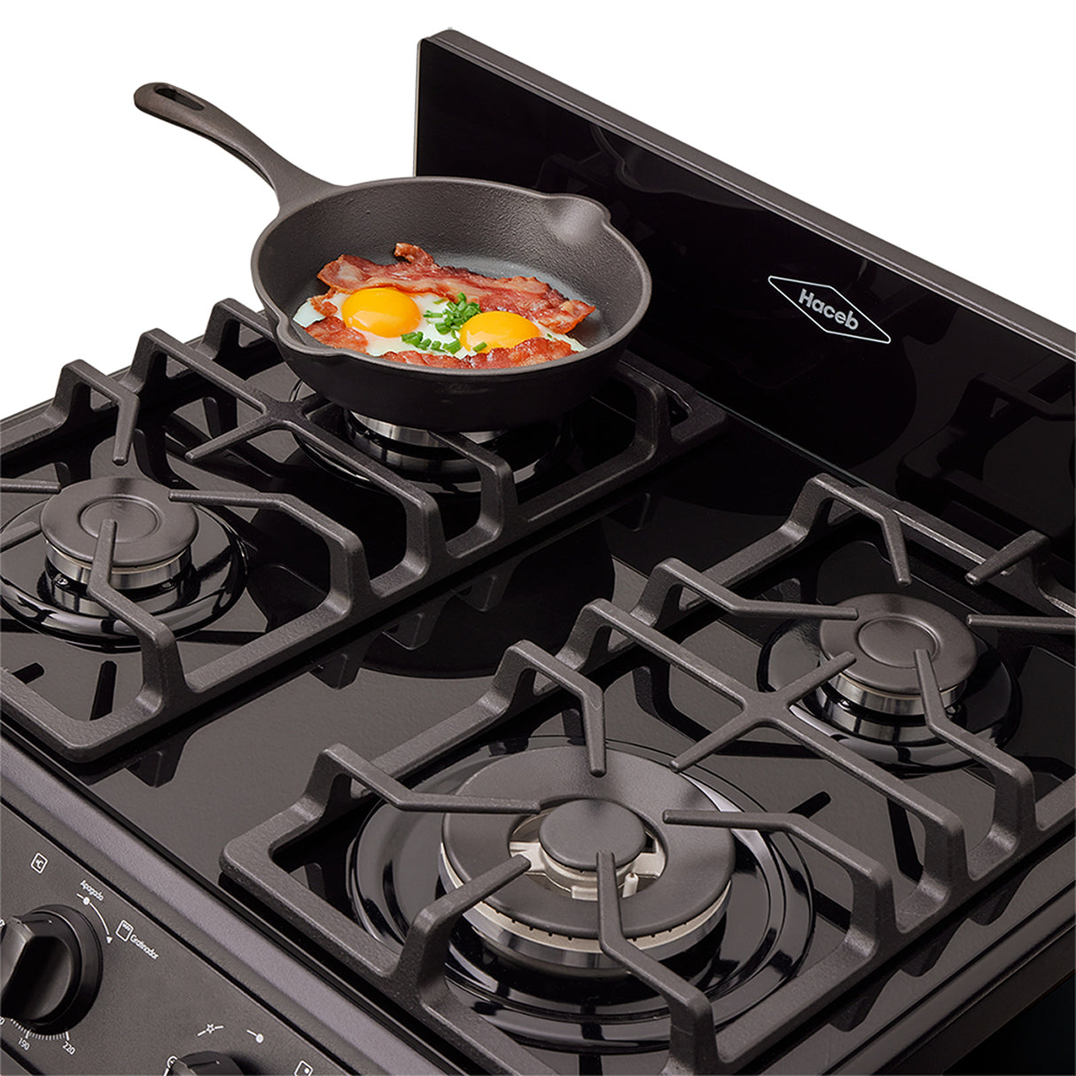 Estufa Haceb Negro 65.5x98.5cm Para Gas Natural con Cuatro Quemadores y con Horno - ESTUFAS | Bylmo