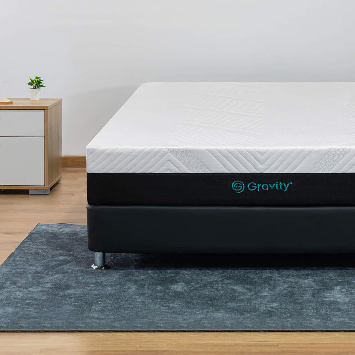 Combo Colchón Enrollado Gravity P24 Blanco Sencillo 100 X 190 Cm Ortopedico Firmeza Medio con Una Almohada Stellar Soft y Un Protector de Colchón