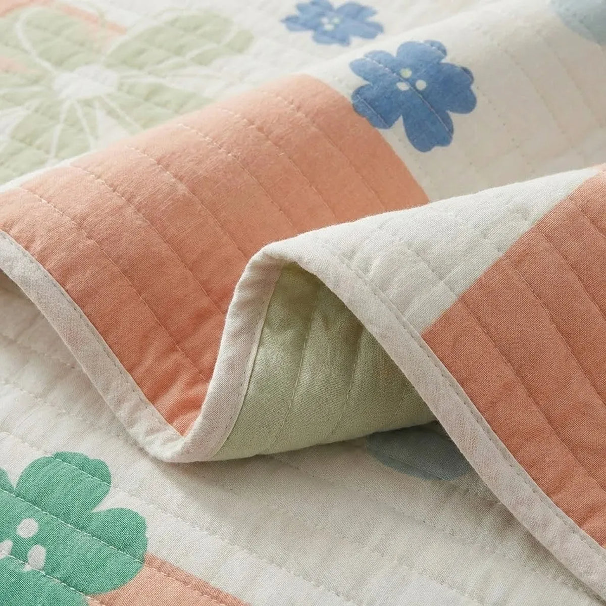 Cubrelecho semidoble Rosella floral salmón doble faz en microfibra 120x190 cm